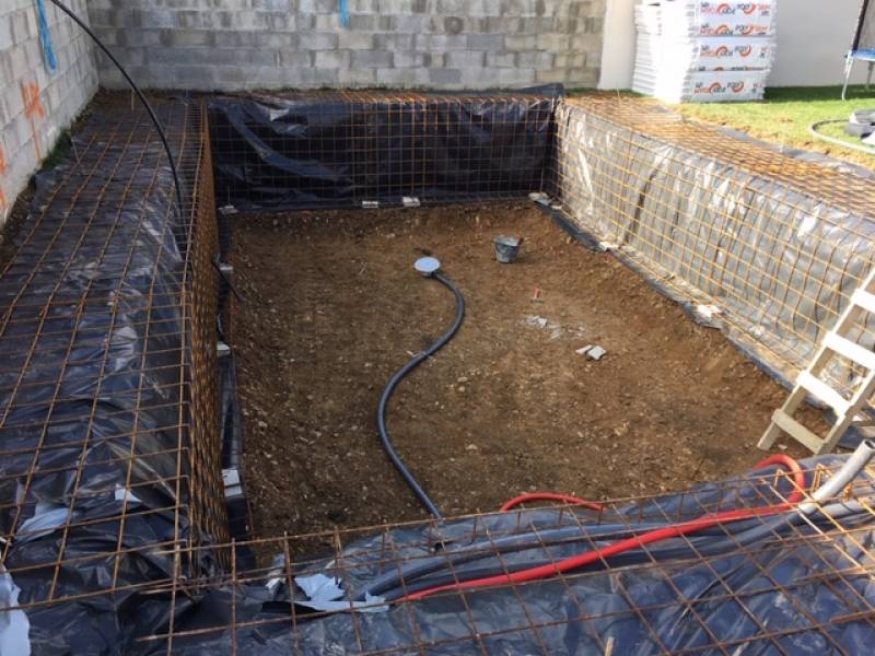 CONSTRUCTION D' UNE PISCINE EN BÉTON ARME